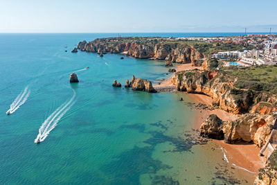 Aerial from rock formations near lagos in portugal