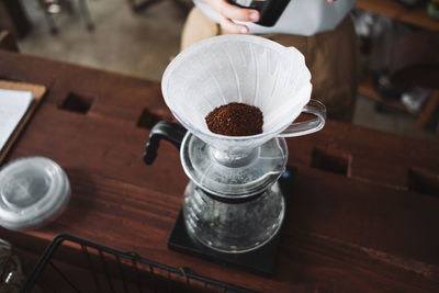 High angle view of coffee cup on table