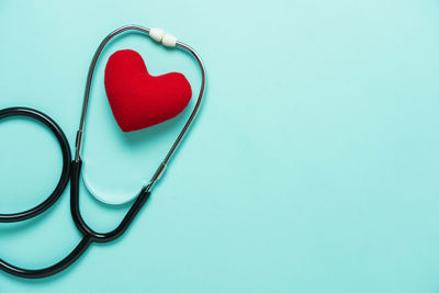 Close-up of heart shape over white background