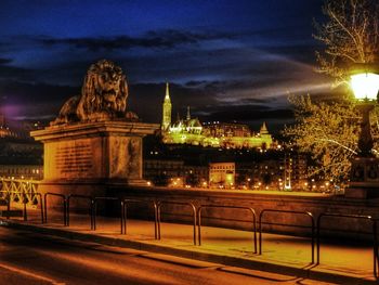 Illuminated street light at night