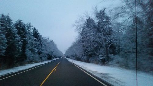 Road passing through country road