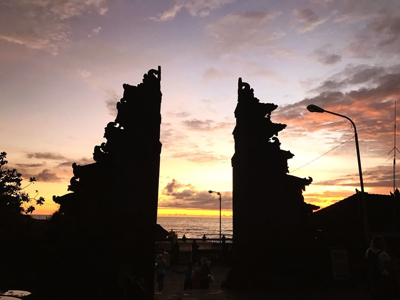 sunset, sky, silhouette, outdoors, travel destinations, cloud - sky, sea, beauty in nature, nature, building exterior, architecture, no people, water, day