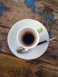 Directly above shot of coffee cup on table