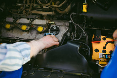 Cropped image of man working in factory