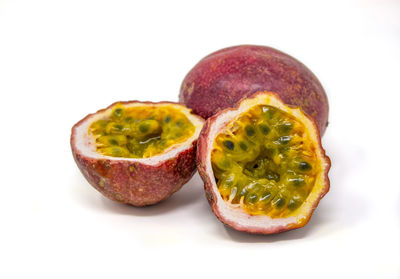 Close-up of fruits against white background