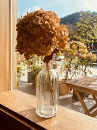 Close-up of glass vase on table