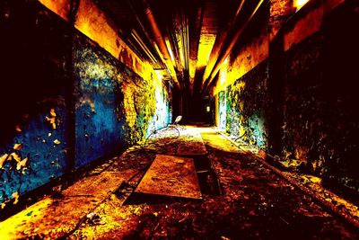 Interior of abandoned illuminated tunnel