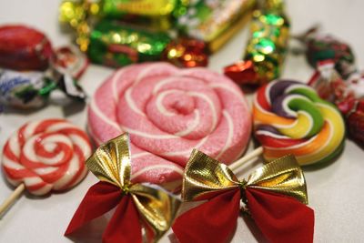 High angle view of colorful lollipops on table during christmas