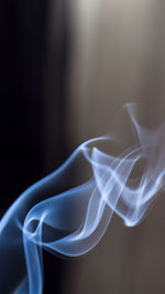 Close-up of smoke over black background