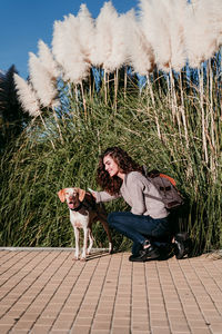 Dog and woman with dogs outdoors