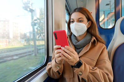 Young woman using mobile phone