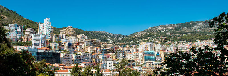 Cityscape against clear sky