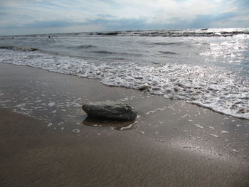 View of sea against cloudy sky