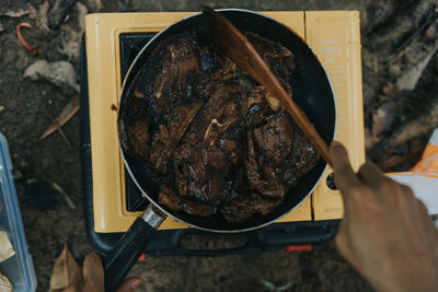 High angle view of person preparing food