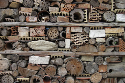 Full frame shot of old stack of firewood