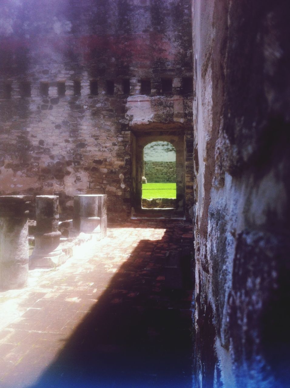 indoors, architecture, built structure, arch, wall - building feature, tunnel, old, abandoned, building, window, the way forward, wall, day, weathered, no people, interior, narrow, damaged, archway, building exterior