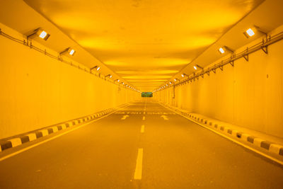 Illuminated lights in empty corridor