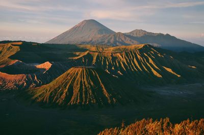 Scenic view of volcanic mountain against sky