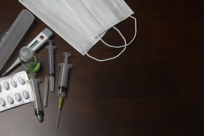 High angle view of paper on table