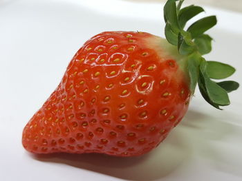 Close-up of strawberry against white background