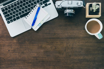 High angle view of coffee cup on table