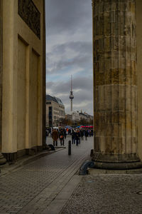 People in front of historical building