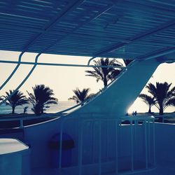 Close-up of swimming pool against blue sky