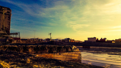 Cityscape against sky during sunset