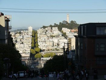 View of road along buildings