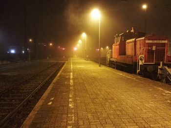 Railroad tracks at night