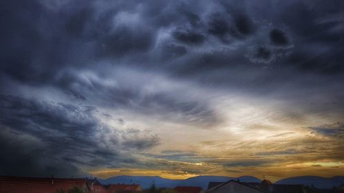 Scenic view of dramatic sky during sunset