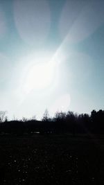 Silhouette of trees against sky