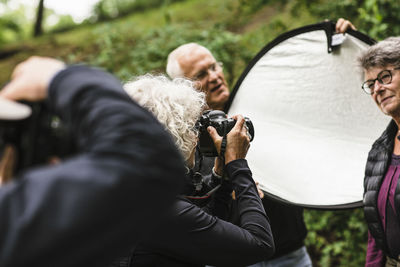 Senior people learning during photography course