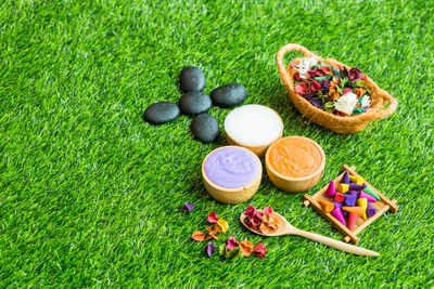 High angle view of multi colored decoration on grass