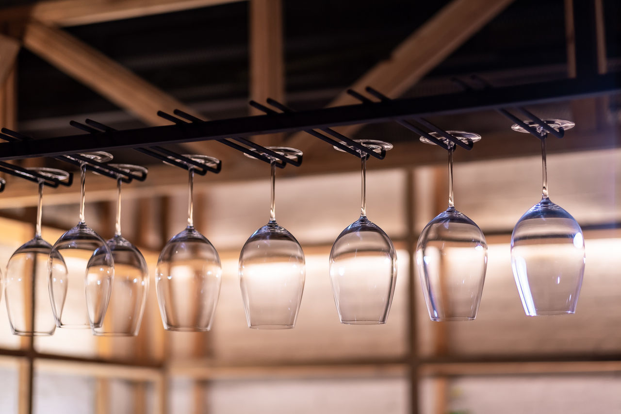 CLOSE-UP OF LAMPS HANGING ON RACK