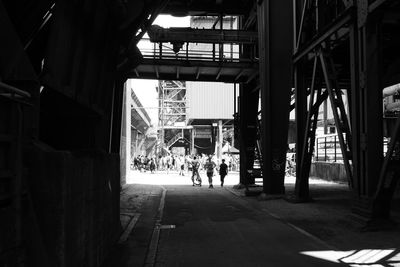 People walking on street in city