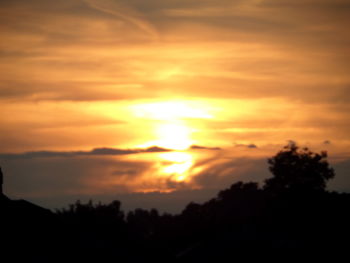 Scenic view of dramatic sky during sunset