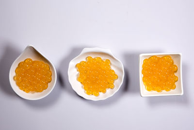 Close-up of ice cream over white background
