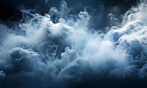 Close-up of smoke against black background