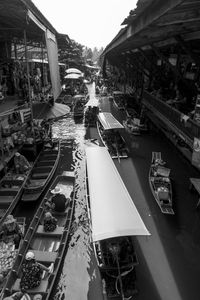 High angle view of boats moored in water