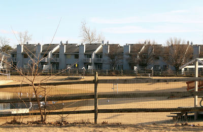 Buildings in city against sky