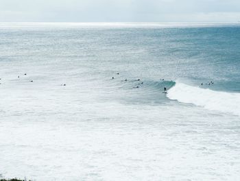 Scenic view of sea against sky during winter