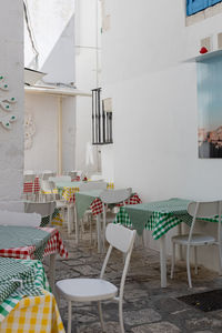 A beautiful view of the tables of a home restaurant in the city of ostuni.