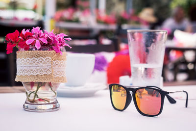 Close-up of sunglasses on table