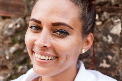 Portrait of smiling young woman