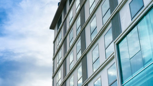 New apartment building over blue sky,low angle architectural exterior view of modern