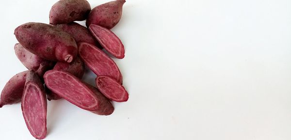 Close-up of strawberry over white background