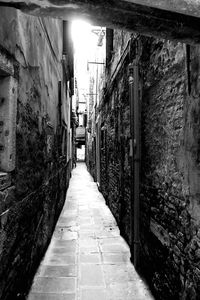 Narrow alley along buildings