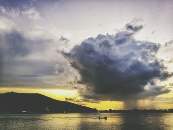 Scenic view of dramatic sky over sea