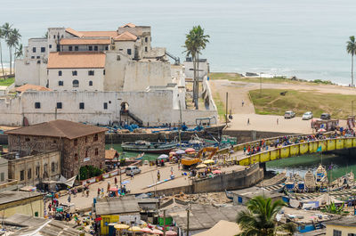 High angle view of people by sea against sky